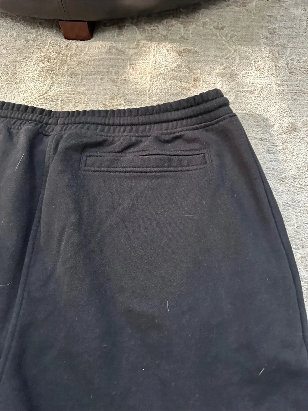 The North Face Men’s Large duo of one gray sweatpants and one black jogger.